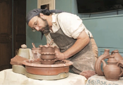 Potter engaged in his craft